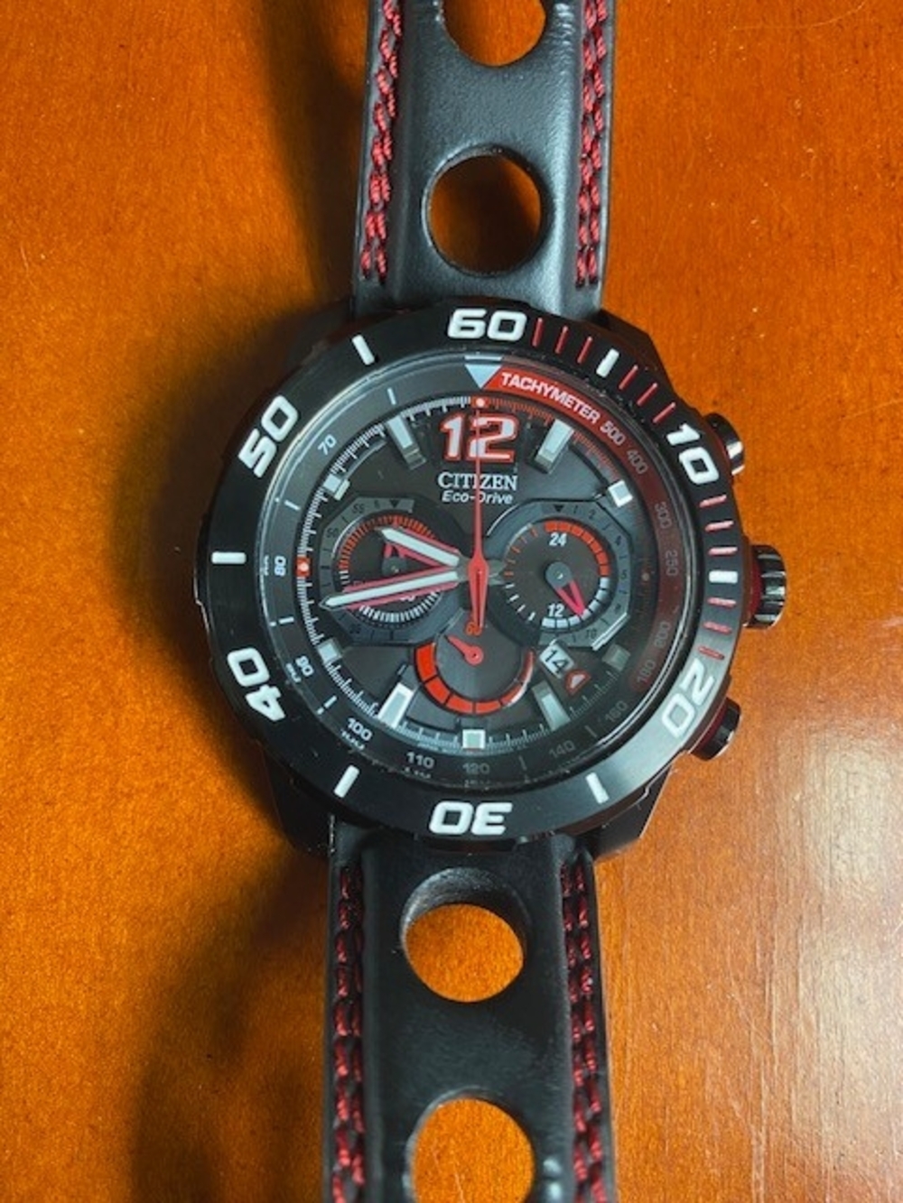 Citizen Eco-Drive Men’s Black and Red Sport Chronograph Watch. Caliber GN-4-S